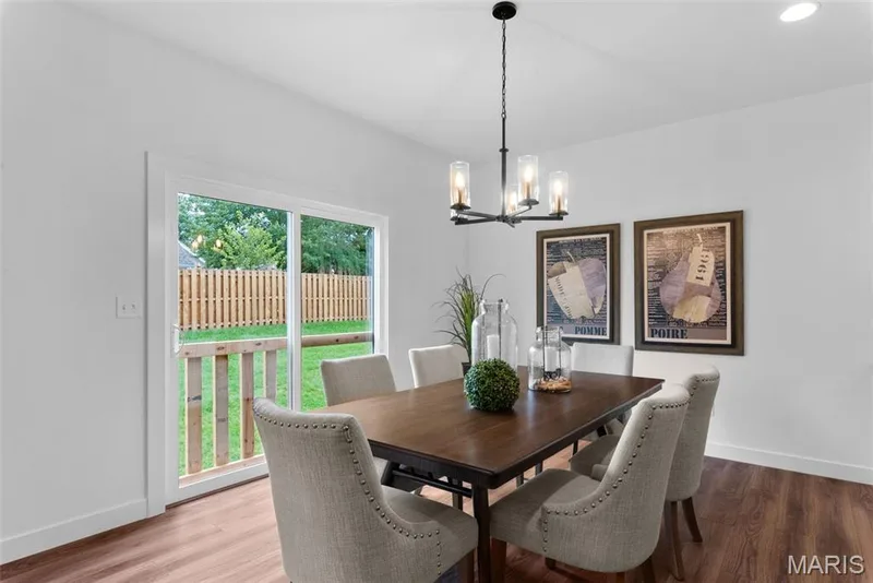 Dining area featuring a chandelier, wood finished floors, and recessed lighting — 1 TBB Rochester @ Kreder Farms, St Charles, MO 63304