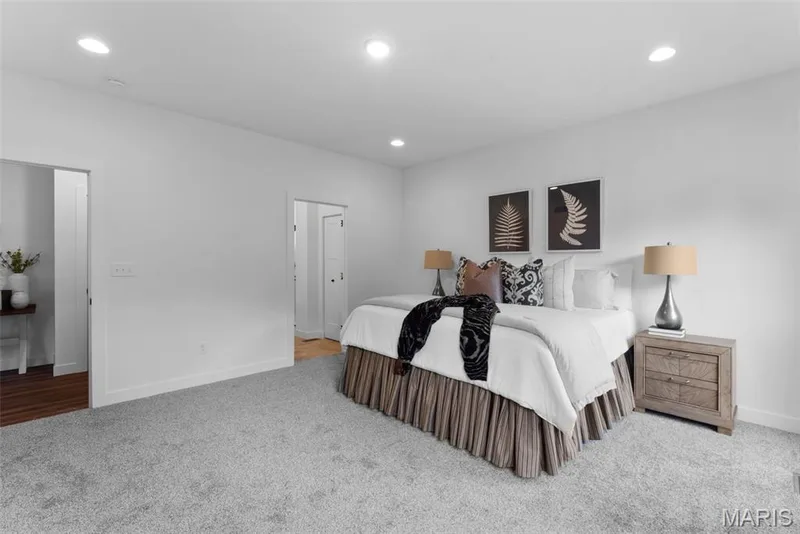 Bedroom with light colored carpet and recessed lighting — 1 TBB Rochester @ Kreder Farms, St Charles, MO 63304