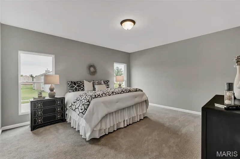 Carpeted bedroom with baseboards — 1 TBB Sienna @ Kreder Farms, St Charles, MO 63304