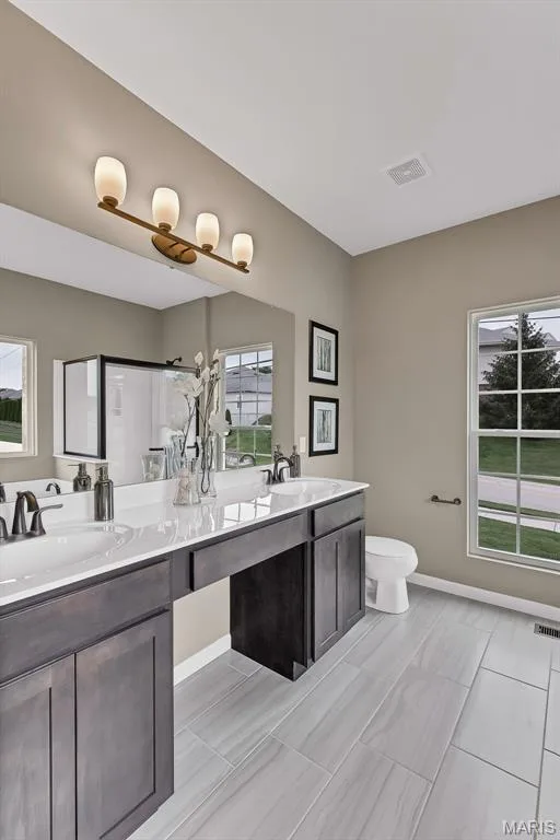 Bathroom with double vanity and a shower stall — 1 TBB Sienna @ Kreder Farms, St Charles, MO 63304