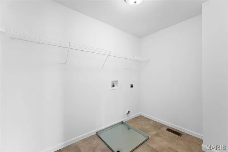 Laundry room featuring hookup for a washing machine and electric dryer hookup — 1 TBB Barkley @ Kreder Farms, St Charles, MO 63304