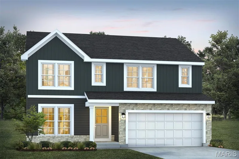 View of front facade featuring stone siding, a garage, concrete driveway, board and batten siding, and a shingled roof — 1 TBB Barkley @ Kreder Farms, St Charles, MO 63304