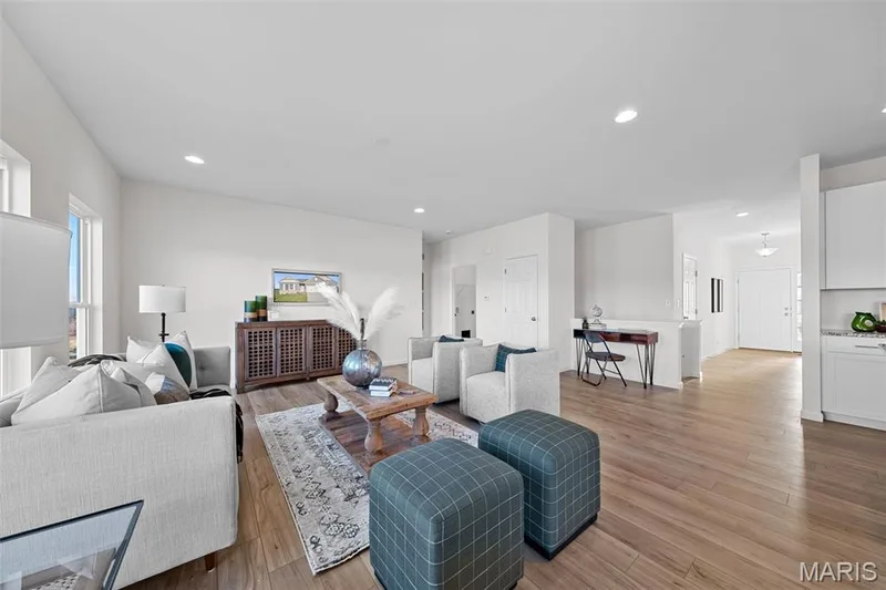 Living area with light wood-type flooring and recessed lighting — 1 TBB Westbrook @ Kreder Farms, St Charles, MO 63304