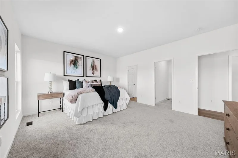 Carpeted bedroom featuring baseboards — 1 TBB Westbrook @ Kreder Farms, St Charles, MO 63304