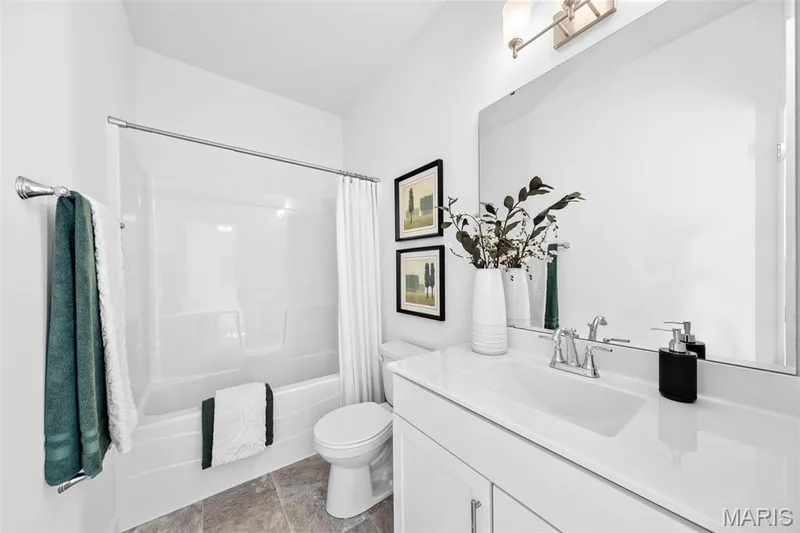 Full bath featuring shower / tub combo with curtain and vanity — 1 TBB Westbrook @ Kreder Farms, St Charles, MO 63304