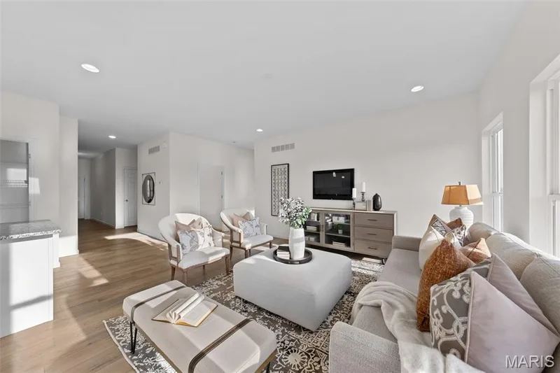 Living area with recessed lighting and light wood-style flooring — 1 TBB Savoy @ Kreder Farms, St Charles, MO 63304