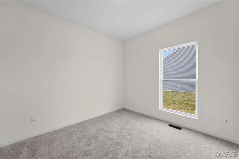 Carpeted spare room featuring baseboards — 1 TBB Savoy @ Kreder Farms, St Charles, MO 63304