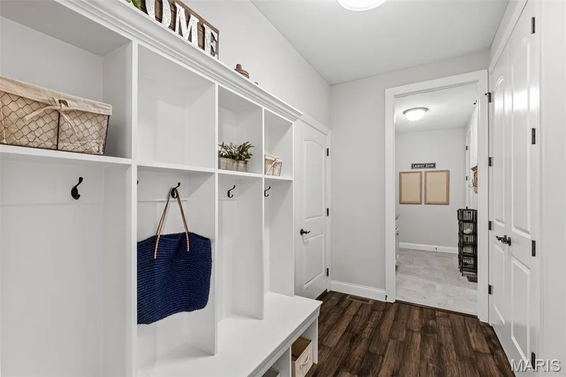 Mudroom featuring dark wood finished floors and baseboards — 1 TBB Kingston @ Kreder Farms, St Charles, MO 63304
