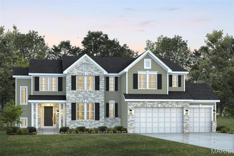 View of front facade with concrete driveway, a garage, a front lawn, and brick siding — 1 TBB Kingston @ Kreder Farms, St Charles, MO 63304