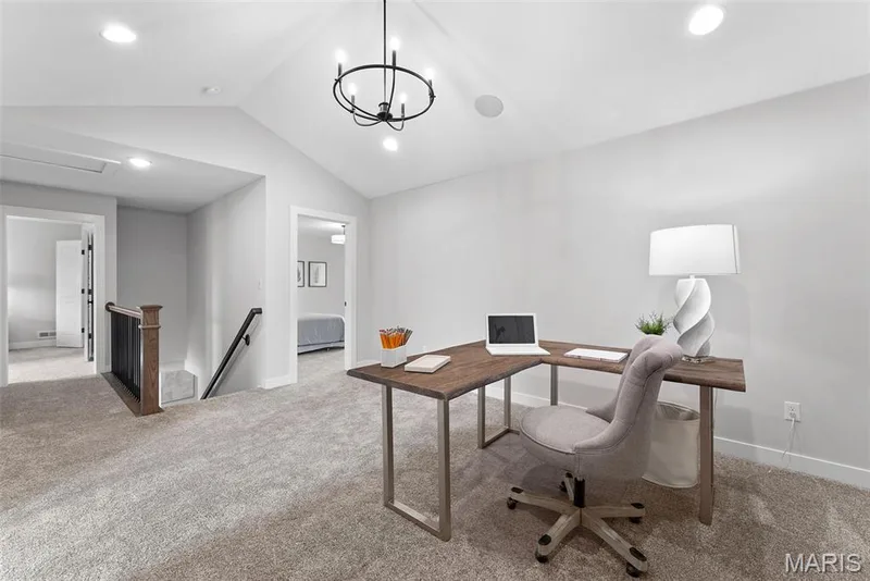 Home office with vaulted ceiling, light colored carpet, recessed lighting, and a chandelier — 1 TBB Bridgeport @ Kreder Farms, St Charles, MO 63304