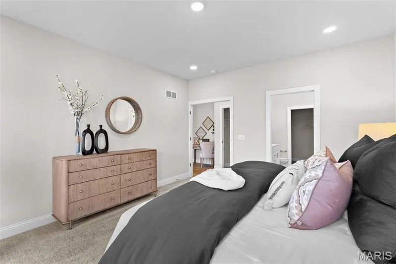 Carpeted bedroom with recessed lighting and a walk in closet — 1 TBB Rockport @ Creekside Sommers, O'Fallon, MO 63367