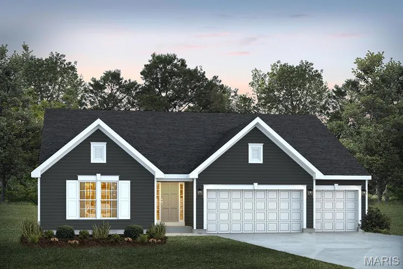 View of front of house featuring concrete driveway, a garage, and a lawn — 1 TBB Canterbury @ Creekside Sommers, O'Fallon, MO 63367