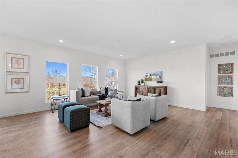 Living room featuring recessed lighting and light wood finished floors — 1 TBB Westbrook @ Creekside Sommers, O'Fallon, MO 63367
