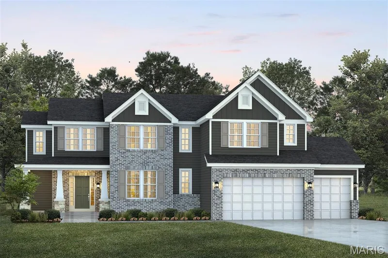 View of front of home featuring board and batten siding, concrete driveway, an attached garage, and brick siding — 1 TBB Kingston @Willow Grove, Dardenne Prairie, MO 63368