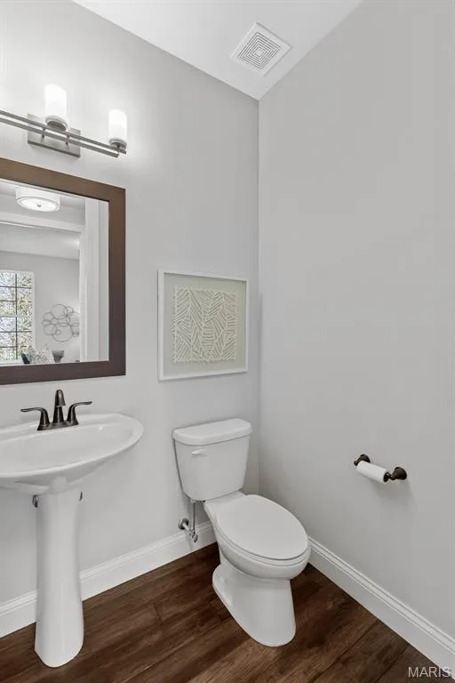 Bathroom with dark wood-style floors — 1 TBB Kingston @ Chateau De Fond Du Lac, Lake St. Louis, MO 63367