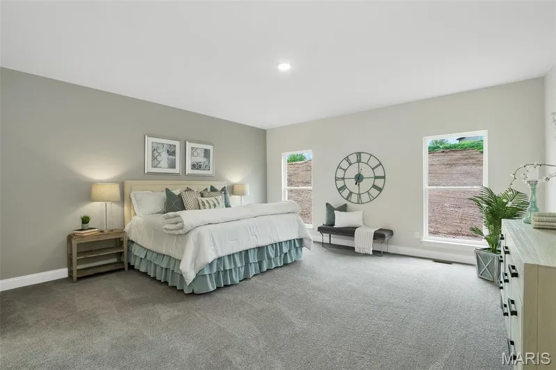 Carpeted bedroom with multiple windows and recessed lighting — 1 TBB Waverly @Willow Grove, Dardenne Prairie, MO 63368