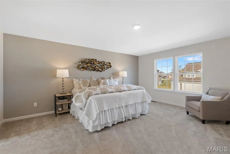 Bedroom featuring light colored carpet and baseboards — 1 TBB Princeton @Willow Grove, Dardenne Prairie, MO 63368