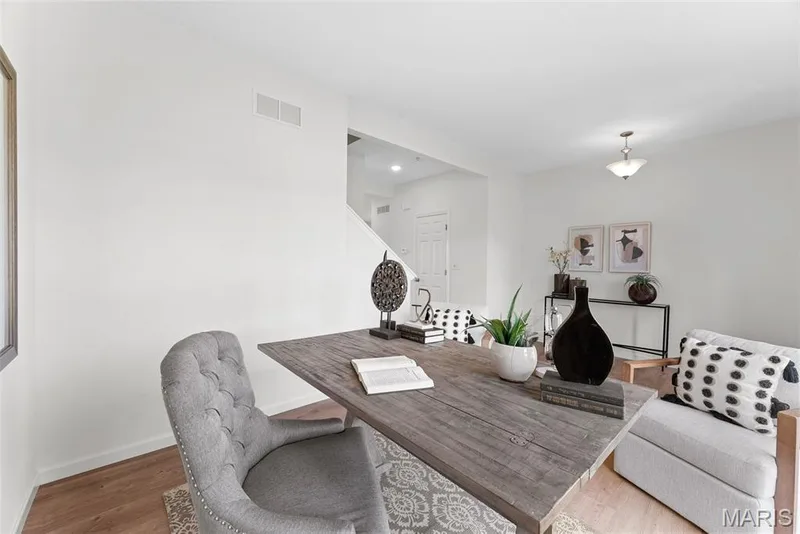 Office space featuring wood finished floors and baseboards — 1 TBB Barkley @ Creekside Sommers, O'Fallon, MO 63367