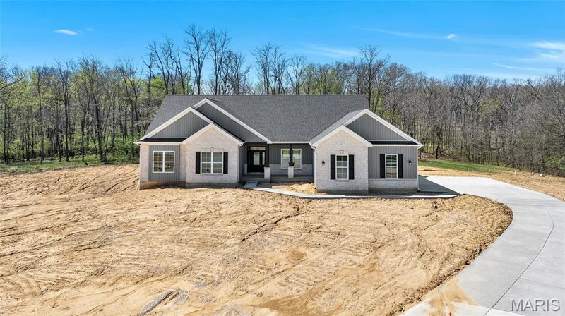 Photo of a previously built Dogwood model. Some upgraded features and options shown. — The Dogwood@The Ests @ Schaper Farms, Foristell, MO 63348