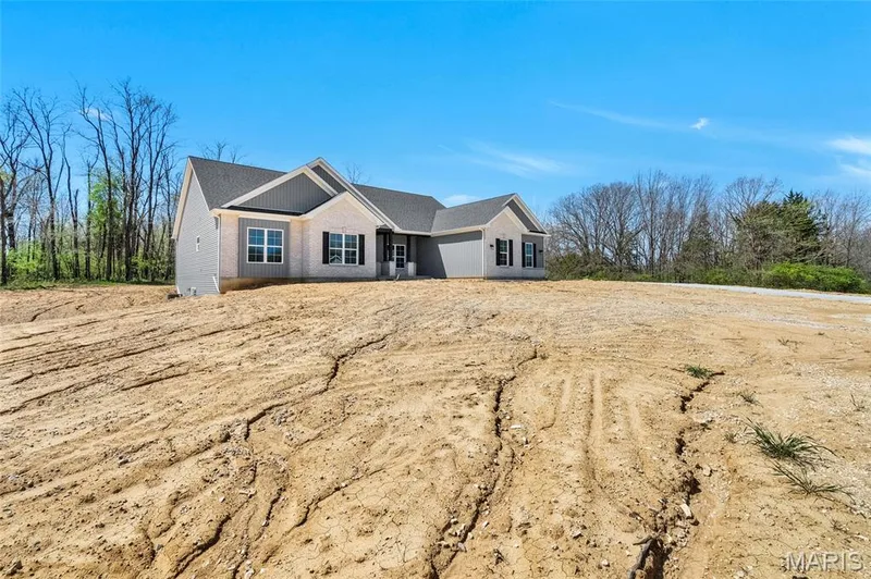 Photo of a previously built Dogwood model. Some upgraded features and options shown. — The Dogwood@The Ests @ Schaper Farms, Foristell, MO 63348
