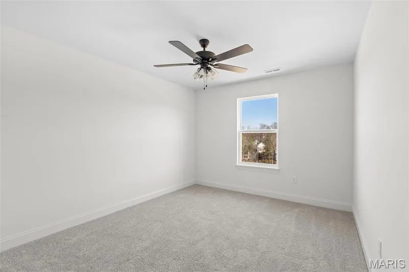 Spare room with carpet and ceiling fan — 3 Sequoia at Bluestem Estates, St Charles, MO 63367