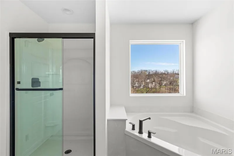 Bathroom featuring plus walk in shower — 3 Sequoia at Bluestem Estates, St Charles, MO 63367