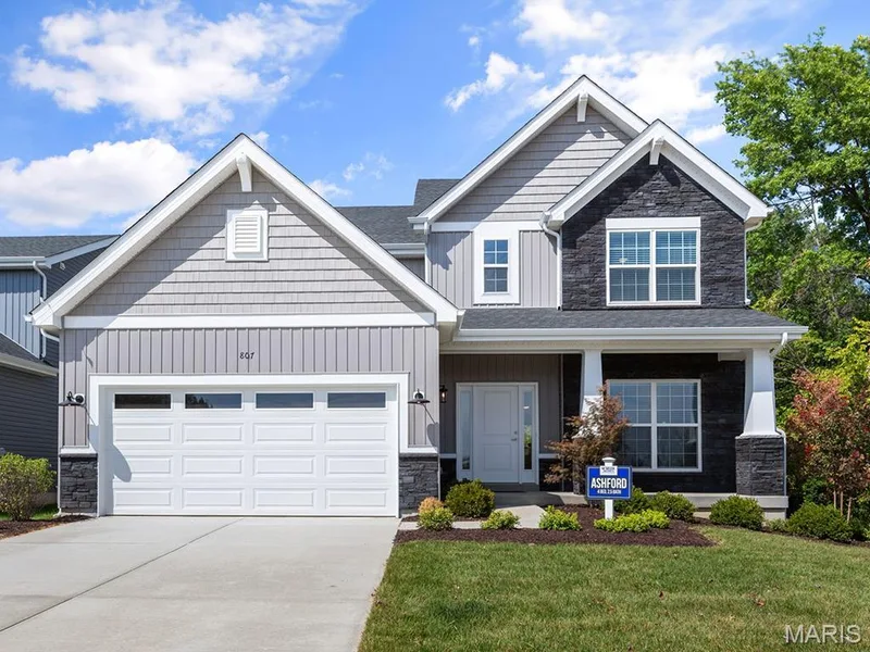 Craftsman inspired home with a front yard and a garage — 3 Ashford at Elm Crossing, St Charles, MO 63301