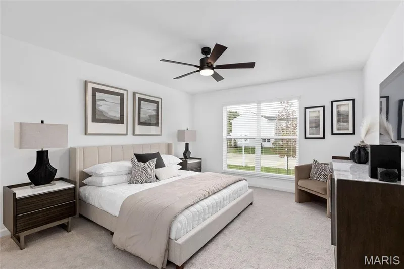 Carpeted bedroom with ceiling fan — 3 Aspen at Elm Crossing, St Charles, MO 63301