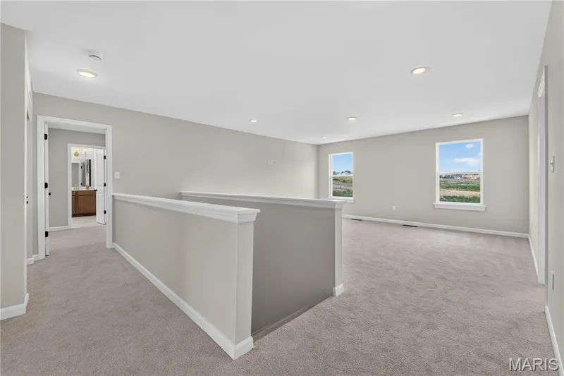 Bonus room with view of stairwell — 431 Oak Barrel Drive, O'Fallon, MO 63385