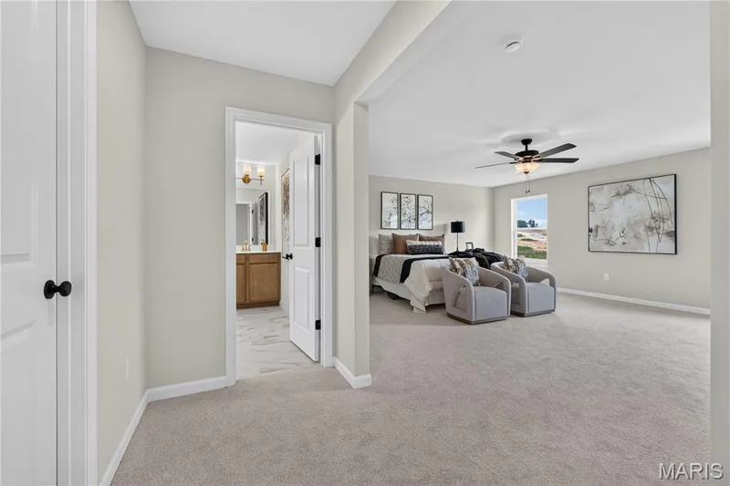 Primary bedroom with ceiling fan — 431 Oak Barrel Drive, O'Fallon, MO 63385
