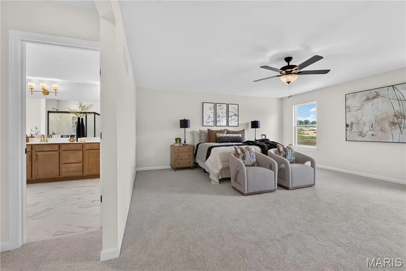 Primary bedroom with ceiling fan — 431 Oak Barrel Drive, O'Fallon, MO 63385