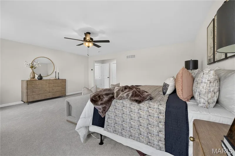 Primary bedroom with ceiling fan — 431 Oak Barrel Drive, O'Fallon, MO 63385