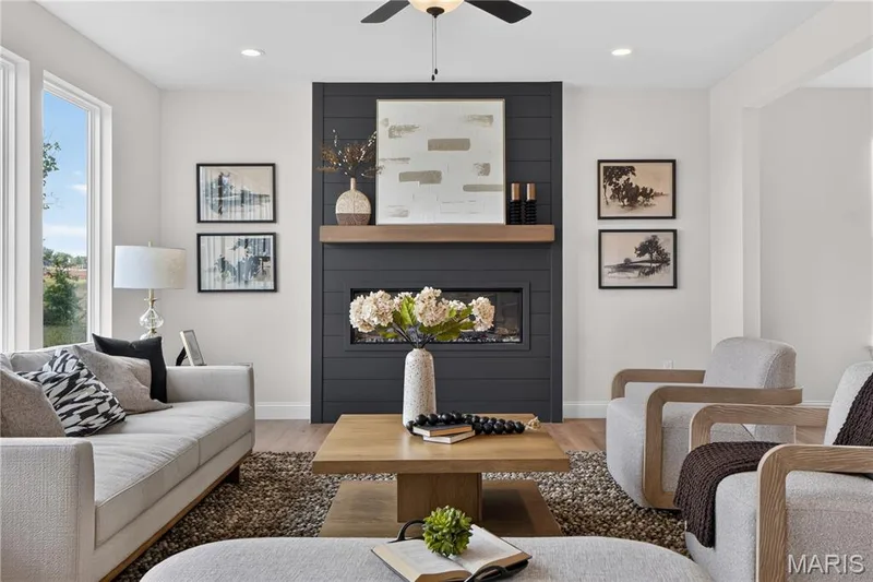 Family room with view of fireplace — 431 Oak Barrel Drive, O'Fallon, MO 63385