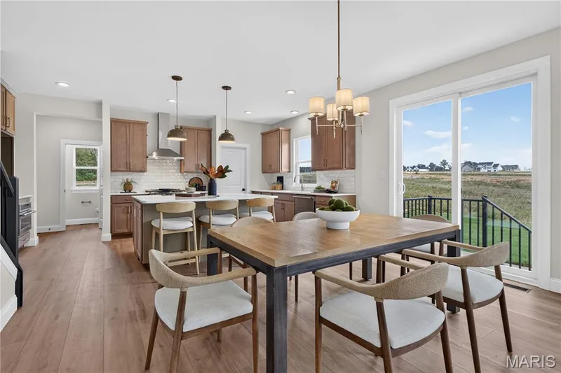 Breakfast area with view of kitchen area — 431 Oak Barrel Drive, O'Fallon, MO 63385