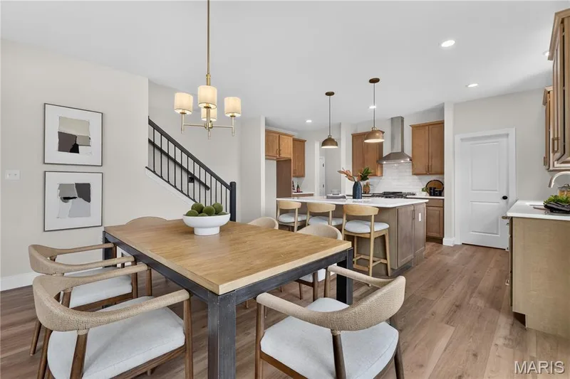 Breakfast area with view of kitchen area — 431 Oak Barrel Drive, O'Fallon, MO 63385