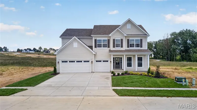 The Windsor elevation 3 by Consort Homes with a 14x14 patio, 8 ft Ingrade with 3 car garage — 431 Oak Barrel Drive, O'Fallon, MO 63385