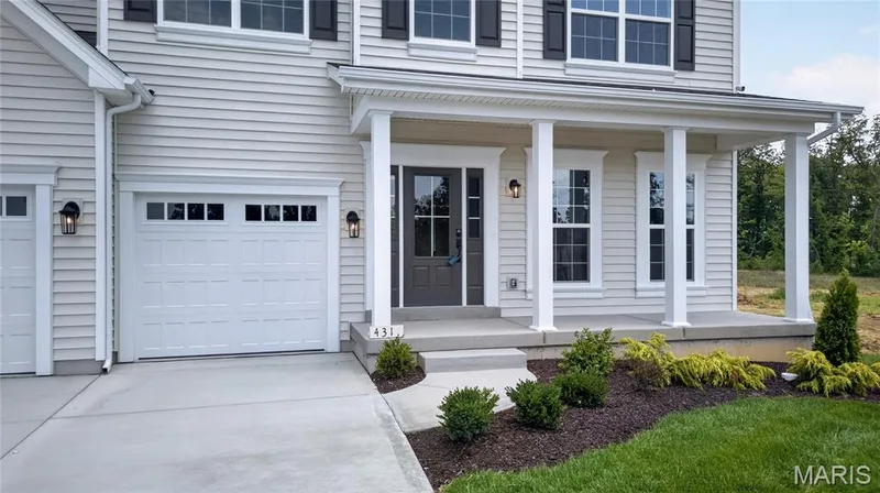 The Windsor elevation 3 by Consort Homes with a 14x14 patio, 8 ft Ingrade with 3 car garage — 431 Oak Barrel Drive, O'Fallon, MO 63385