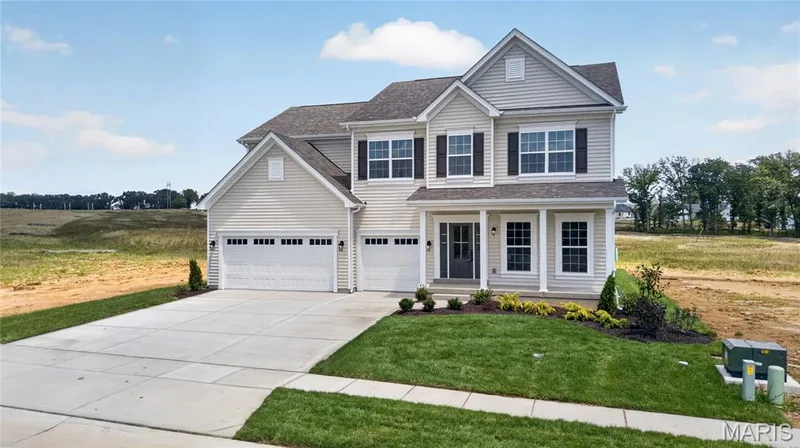 The Windsor elevation 3 by Consort Homes with a 14x14 patio, 8 ft Ingrade with 3 car garage — 431 Oak Barrel Drive, O'Fallon, MO 63385