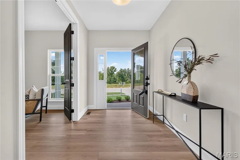 Entrance foyer with view of front door — 431 Oak Barrel Drive, O'Fallon, MO 63385