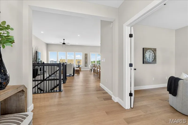 Entrance Foyer with view of Study, stairwell and open living area — 421 Farmhouse Drive, O'Fallon, MO 63385