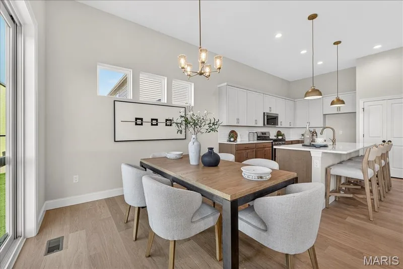 Breakfast area with view of Kitchen — 421 Farmhouse Drive, O'Fallon, MO 63385