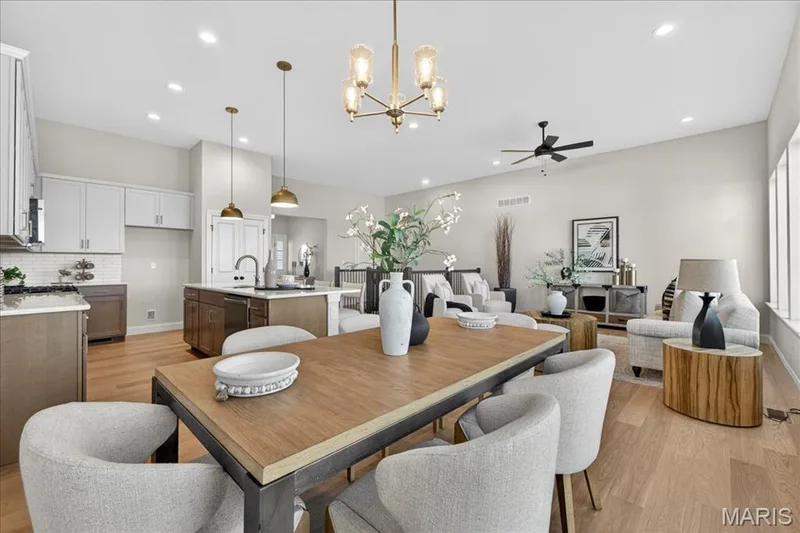 Breakfast area with view of Great Room area — 421 Farmhouse Drive, O'Fallon, MO 63385