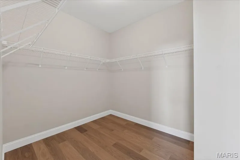 Primary bedroom walk-in closet — 421 Farmhouse Drive, O'Fallon, MO 63385