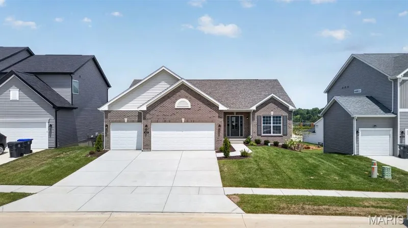 The Davenport by Consort Homes. 8 ft walkout and 3 car garage — 421 Farmhouse Drive, O'Fallon, MO 63385