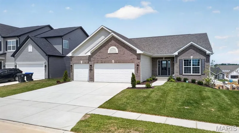 The Davenport by Consort Homes. 8 ft walkout and 3 car garage — 421 Farmhouse Drive, O'Fallon, MO 63385
