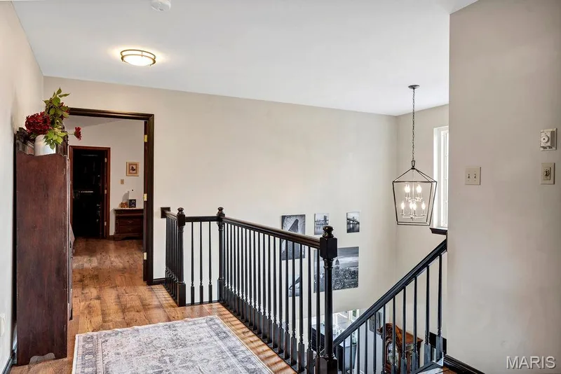 hallway separating primary and additonal bedrooms — 50 Sunfish Drive, Defiance, MO 63341