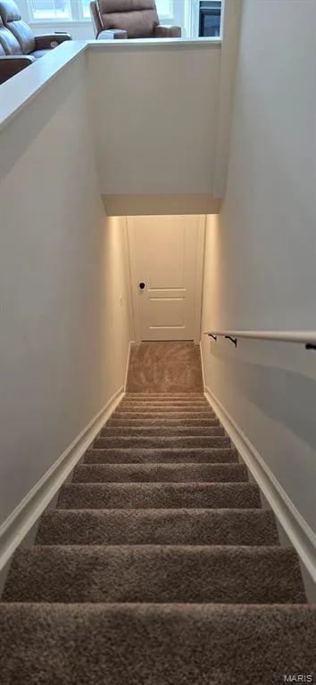 Open stairwell to lower level family room — 327 Dalriada Boulevard, O'Fallon, MO 63368