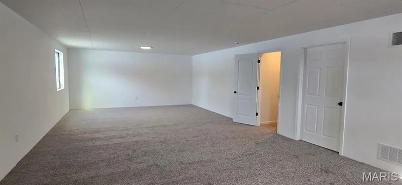 Newly completed lower level family room — 327 Dalriada Boulevard, O'Fallon, MO 63368
