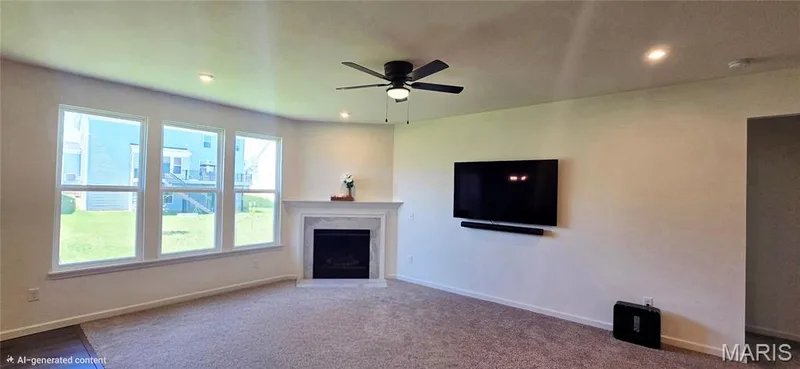 Cozy corner fireplace, ceiling fan added — 327 Dalriada Boulevard, O'Fallon, MO 63368