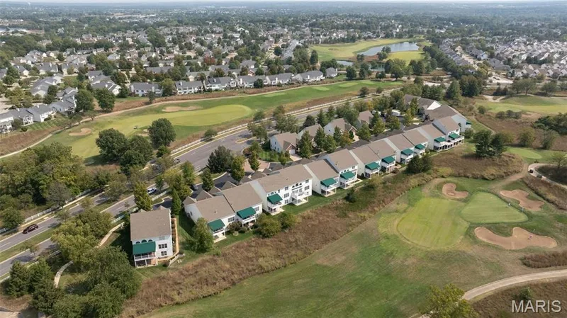 backyards of villas across the street. — 112 Wake Forest Place, O'Fallon, MO 63368